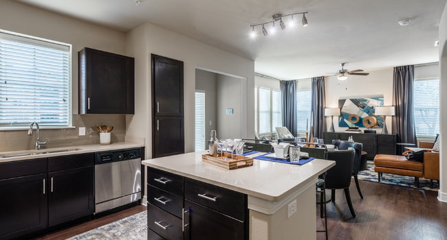 Custom Cabinetry with Designer Hardware and Tile Backsplash