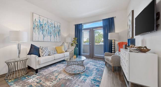 Charming Living Room with Hardwood-Style Flooring