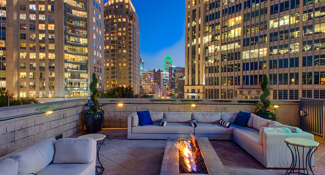 Luxury Rooftop Aqua Lounge  with firepit and outdoor seating